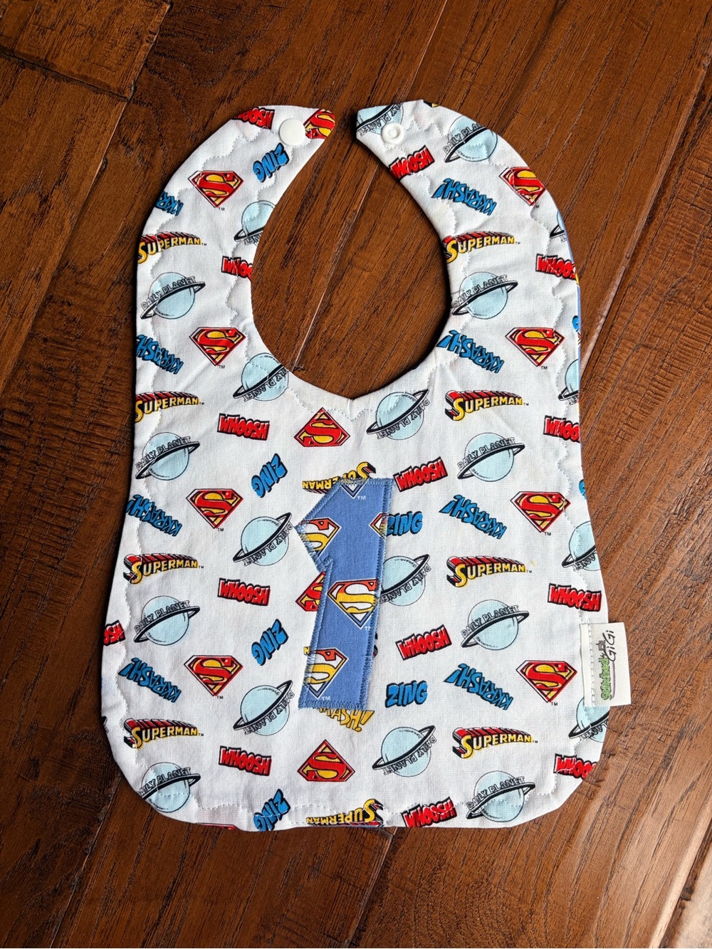 DC Comics Superman White Bib with Blue and Red Accents